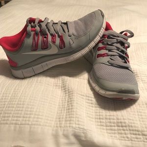 Light grey and pink nike running shoes